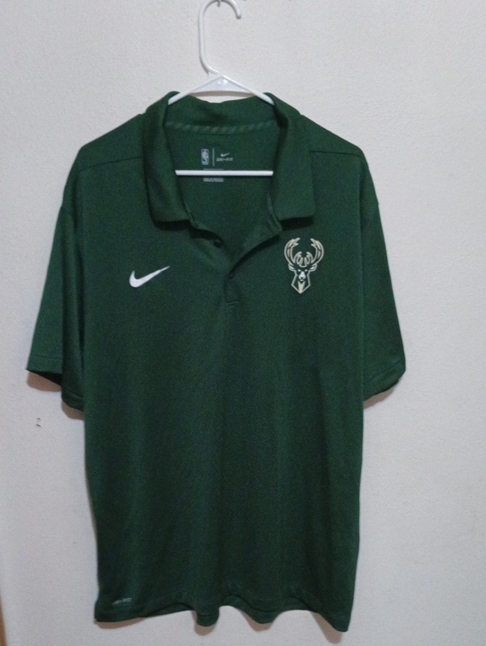 Nike Men’s Dark Green Bucks Polo with White Swoosh